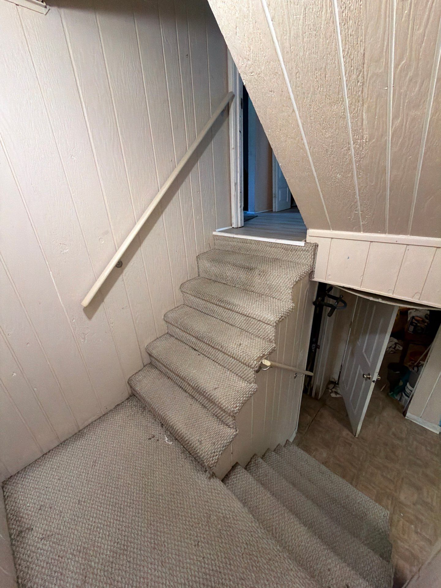 A staircase handrail installed by Brandau Home Services for added safety