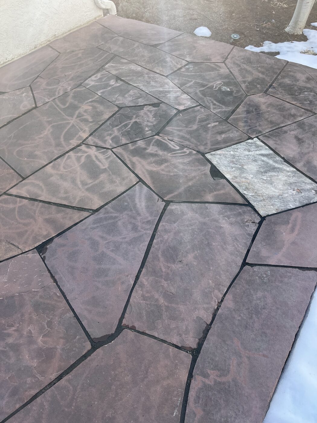 Patio before pressure washing